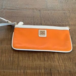 Brand New Dooney & Burke orange leather wristlet